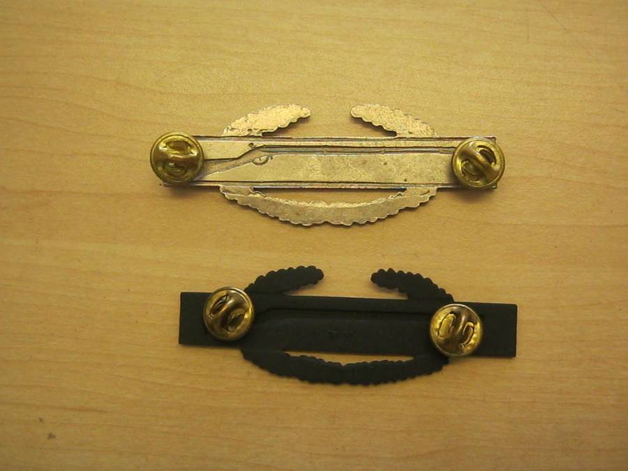 Lot of 2 US Army combat infantry badges.